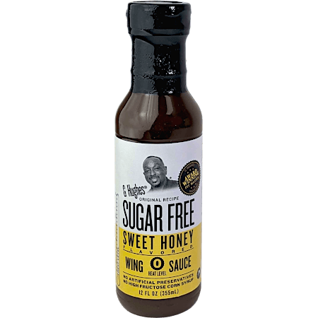 G Hughes Sugar Free Wing Sauce bottle with a white label, showcasing a sweet and spicy flavor profile, ideal for health-conscious fitness enthusiasts.