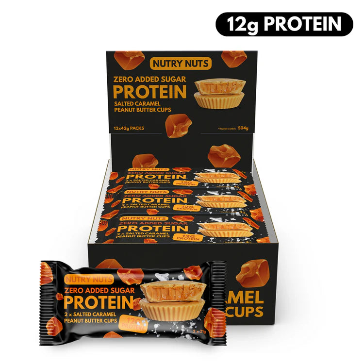 Nutry Nuts Peanut Butter Cups display box featuring twelve packs of salted-caramel, zero sugar protein cups, each pack offering 12g protein, ideal for fitness enthusiasts.