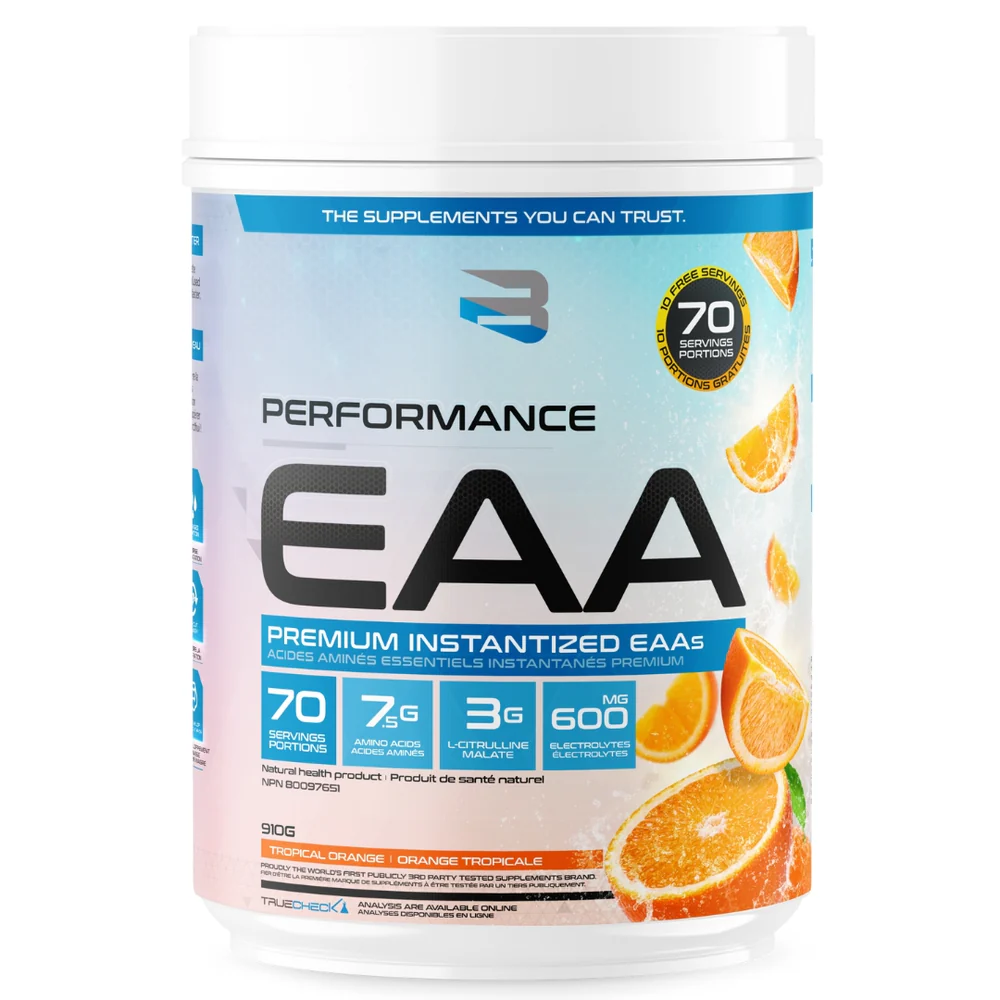 Believe Performance EAA 70 serving in a white container with a blue label, accompanied by oranges, highlighting its essential amino acids for muscle growth and recovery.