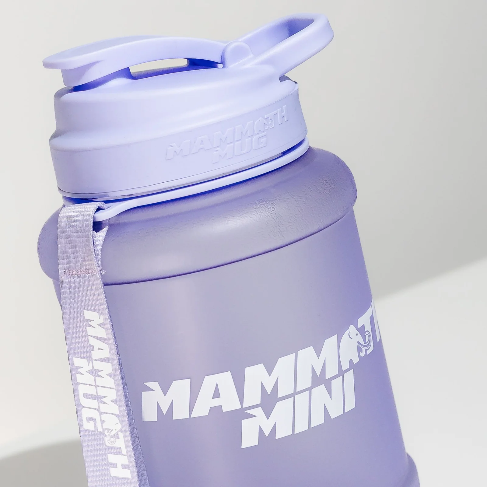 Mammoth Mug Mini 1.5L with wrist lanyard, redesigned leak-proof lid, engraved scale, and wide mouth for easy drinking and cleaning.