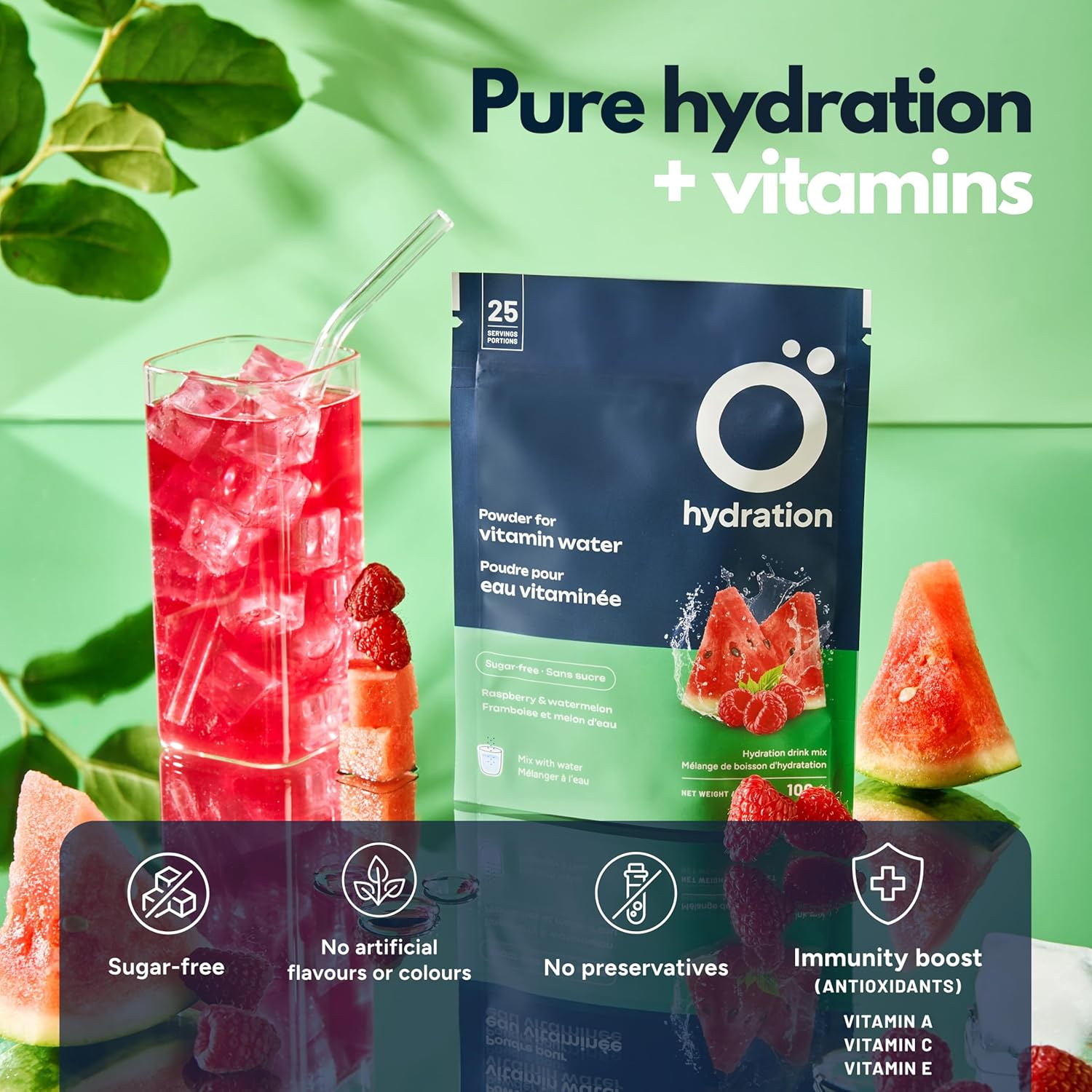 Hydration Vitamized Powder 100g in a pouch with a raspberry-watermelon drink in a glass, surrounded by fresh fruits, promoting hydration and immunity boost.
