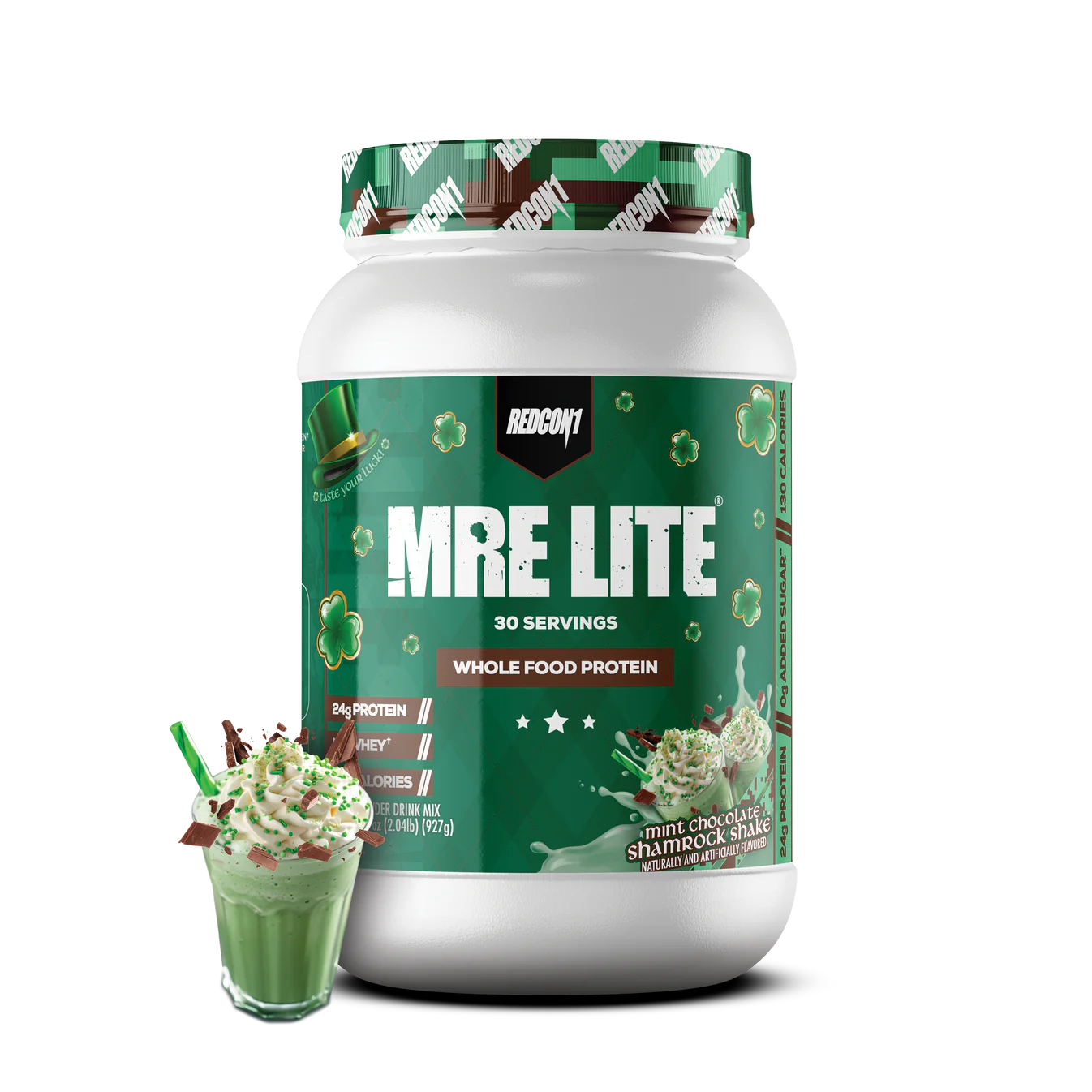 Redcon 1 MRE Lite 1.92lb plastic container with green label beside a glass of green shake, promoting a low-calorie, whole food meal replacement.