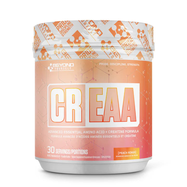 Beyond Yourself CrEAA container close-up, featuring a white and orange label, offers a potent blend of creatine and EAAs for enhanced recovery and performance.