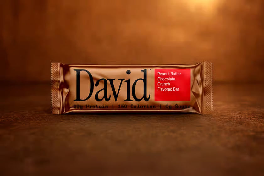 David's Crunch Bar, a Peanut Butter Chocolate Crunch Flavored protein bar, features 20g protein, 150 calories, and 0g sugar, ideal for fitness enthusiasts.