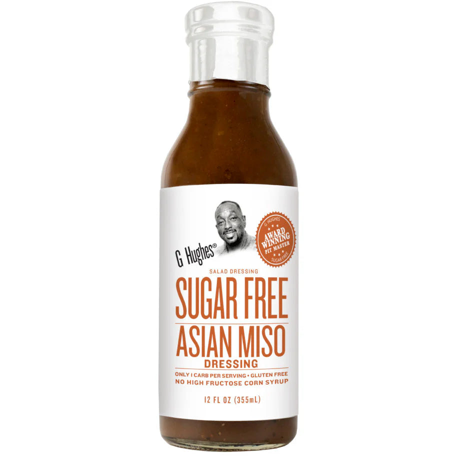 G Hughes Sugar Free Asian Miso dressing bottle with a white label, part of a low-carb, sugar-free condiment line, ideal for fitness-focused lifestyles.